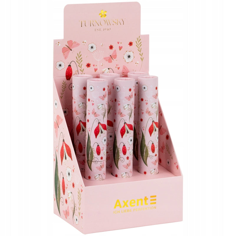 Metalowy długopis Axent obok ozdobnego kartonowego tubusa w tym samym kolorze.