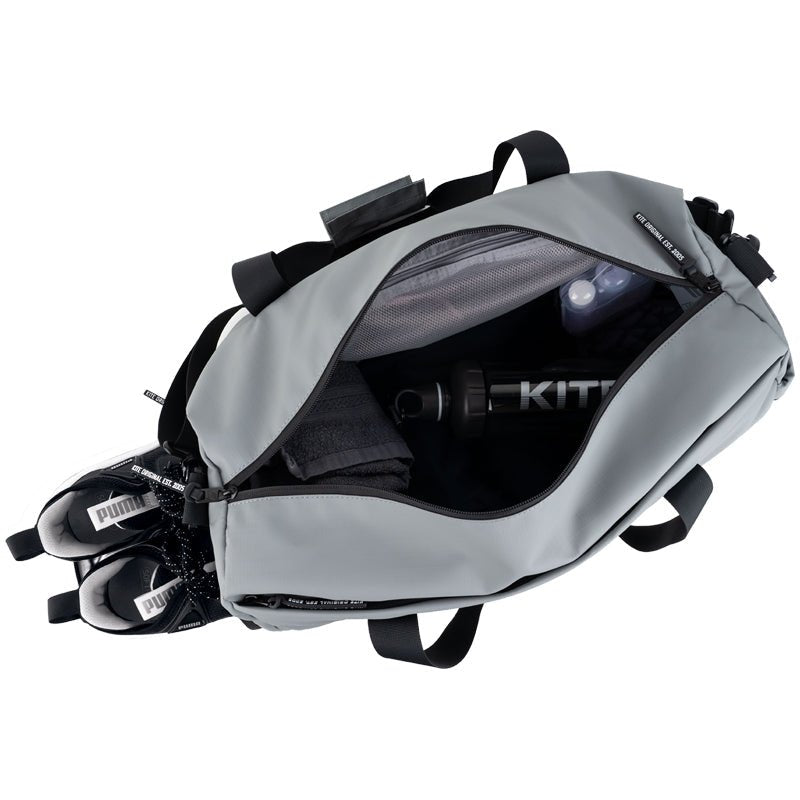 Kompaktowa torba Kite K25-2530-2 dla sportowców, z tekstylnymi uchwytami i pojemnością 20 l.