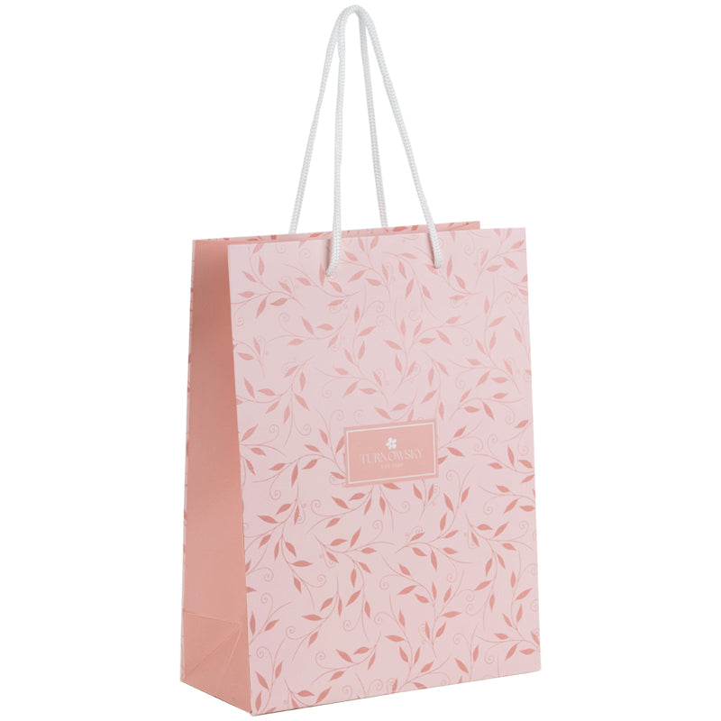 Widok z boku papierowej torby prezentowej Axent.