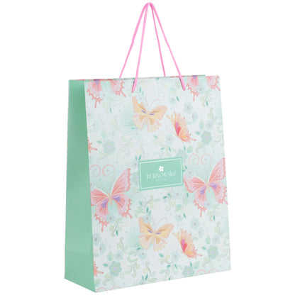 Widok z boku zielonej papierowej torby prezentowej Axent.