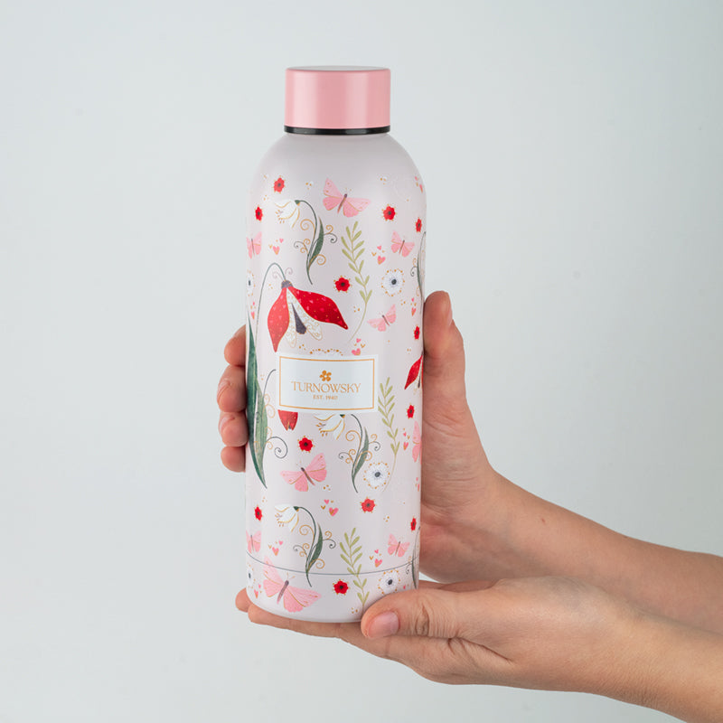 Kobieta z różową butelką termiczną Axent Secret Garden.