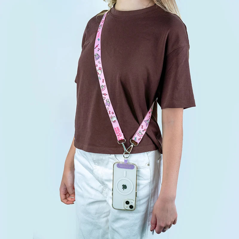 Różowa smycz crossbody Kite Hello Kitty noszona przez dziecko na ukos