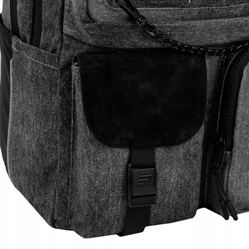 przednie kieszenie w jeansowym plecaku Kite